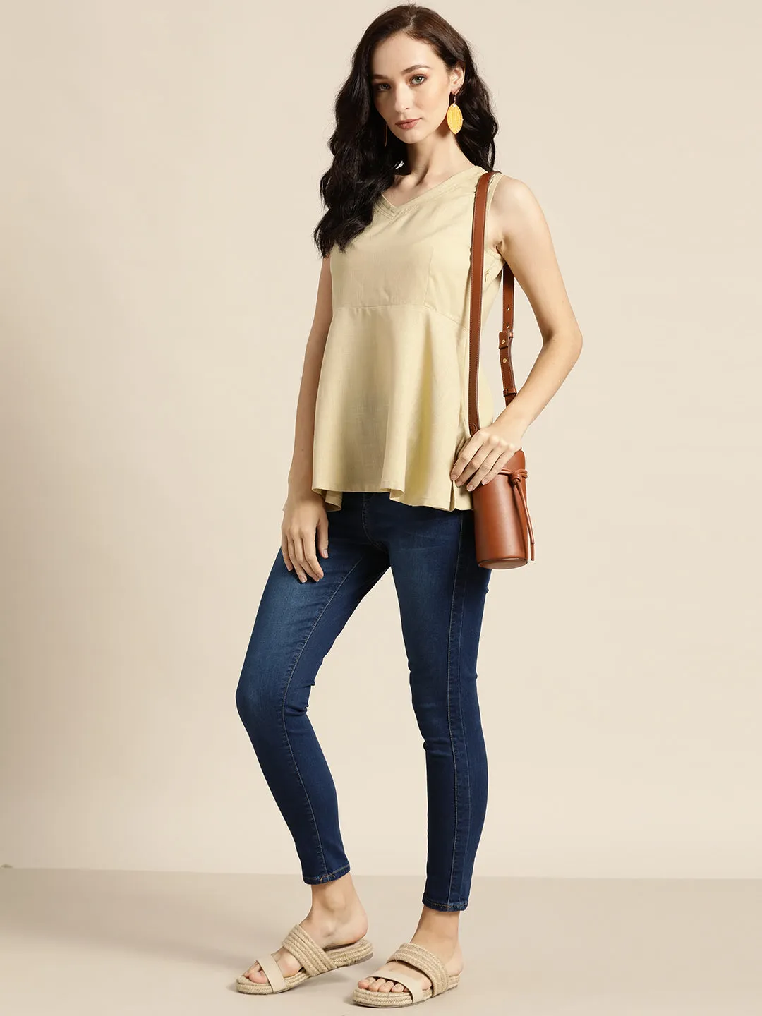 Women Beige Sleeveless Peplum Top